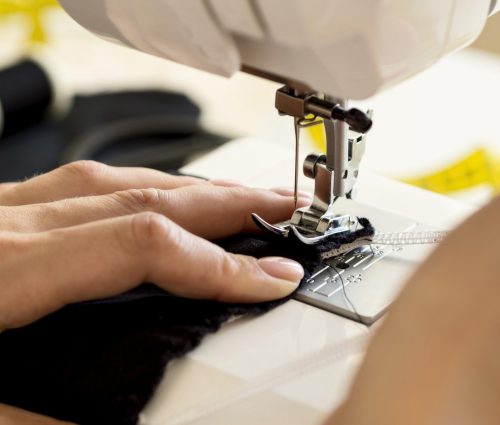 high-angle-sewing-machine-being-used