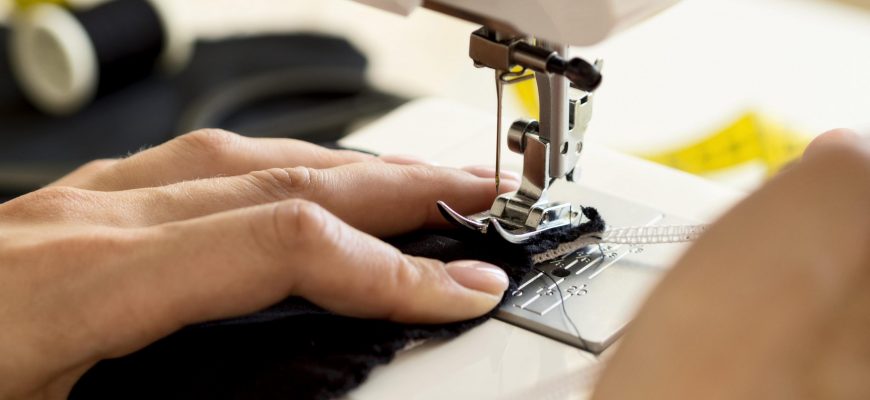 high-angle-sewing-machine-being-used
